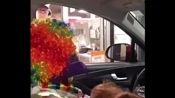 Clown gets dick sucked while ordering food