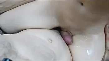 Girlfriend rubs her friend's cock with her pussy while sitting on it