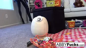 Abigail carves a pumpkin then plays with herself