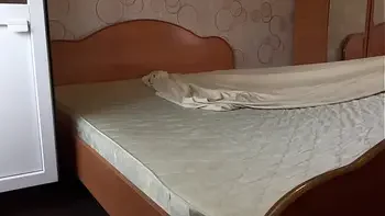 A mature wife masturbates in white panties while cleaning, and a home camera watches her. Big ass, hairy pussy, gorgeous tits and an appetizing figure behind the scenes.