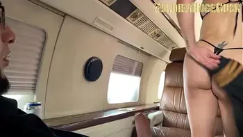 On my business trip I ask my assistant to take care of my wife while I fuck with the stewardesses...she wants to join the orgy together with the pilot