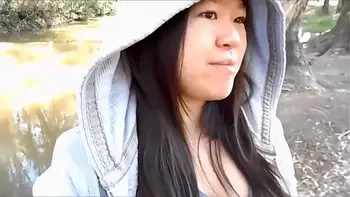 My cute asian girlfriend sucking me off in a public park and swallowing