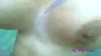 This Italian MILF wants cock at the beach in front of everyone and she sucks and gets fucked while underwater