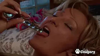 Mature Cougar Lets A Lucky Young Man Piss All Over Her