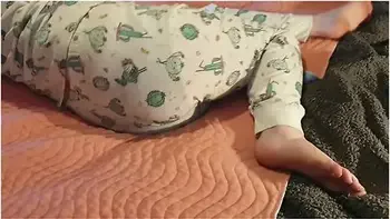 Cute Lazy Girl Wets Her Pyjamas Watching Tv Lying On Her Tummy!