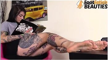 Sexy Barefoot Redhead Hottie Footplays With Her Feet
