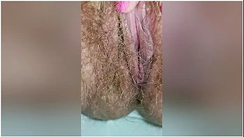 Detailed Close-up Footage Of A Hairy Pussy Girl Urinating From Her Pee Hole And Farting Loudly
