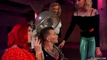 Three femdoms torment feminized slave