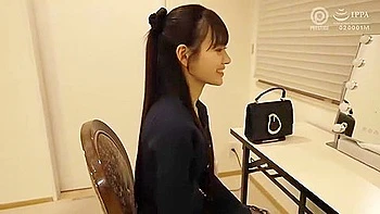 While her breasts are being massaged, a vibrator is inserted and removed.