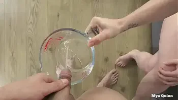 Mya Quinn mixing and drinking piss cocktail wearing anal plug