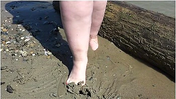 Fat Bare Legs With Red Pedicure Walk Along The Bank Of The River, Fetish