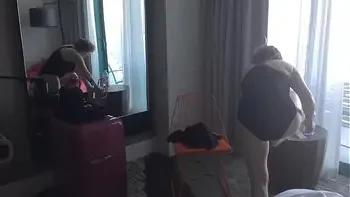 Sexy Grandma is Sexy at 66 in a black swimsuit