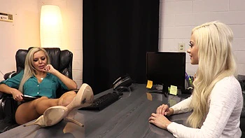 Two cute girls having fun with a big dick in the office