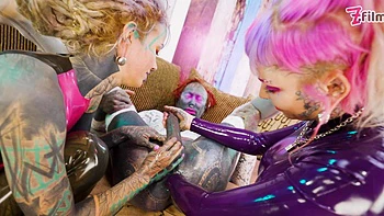 Tattooed trans Lily Lu gets two fists up her ass