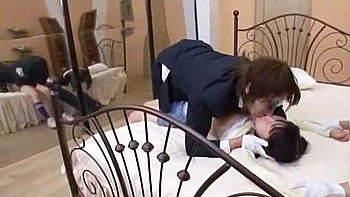 The father thrusts a vibrator in and out while deep-throating the girl.