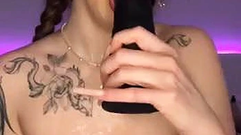 The long-haired nymph in a cat costume provides a deep throat with a yam-sized