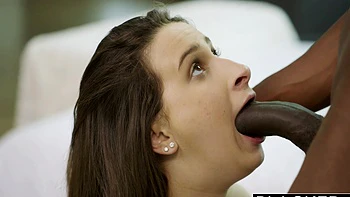 Black dude Moe Johnson fucked Ashley Adams on the bed with passion.