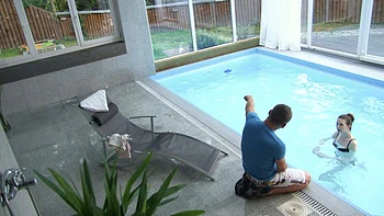 Skinny teen Sunny Honey by the pool with her bikini