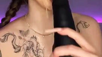 The long-haired gal in a cat costume provides a fellatio with a enormous