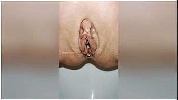 Beautiful Bald Pussy Of Petite Milf Makes The Big Powerful Urine Fountain Close Up