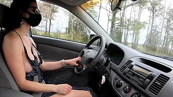 AMwednesday naked in a car