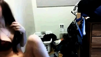 Redhead Webcam Girl Shows Off Her Tattooed Feet and Tits