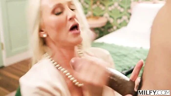 Big-boobed blonde Alexis Malone is enjoying interracial dick-riding