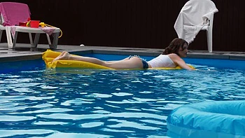 A sexy short solo with Milka Wey by the pool