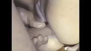 Lustful chick with a ponytail exposes her anal hole and wet pussy under her lover's elastic tongue on the kitchen table