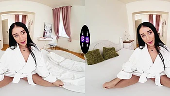 Ara Mix, a cute brunette with long hair, plays with her pussy.