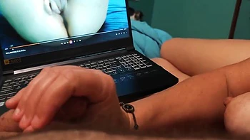 Bella Spanks His Cock While Watching Porn