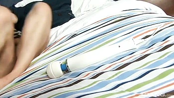 Redhead Casey Mitchell fingers her tight pussy alone