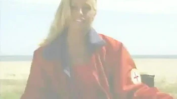 Blonde Babe Shows Off Big Tits Behind