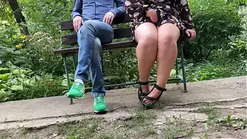 MILF pissing with her legs spread wide I get excited and look