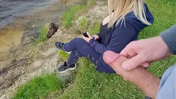 The exhibitionist man saw a lonely girl in nature and took out his dick in front of her and began to masturbate the dick in front unfamiliar beauty, he risks scaring her, but she likes to look at a big male dick and wants to see his cumshot