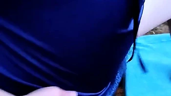 Big-boobed granny masturbates outdoors at party